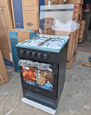 Cuisinière 4 Feux Avec Four Midea Solide Et Original