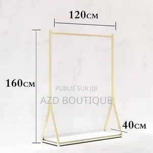 Porte-Vêtements Doré Présentoir Luxe Pour Vêtements Et Accessoires