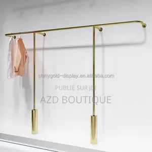 Porte-Vêtements Doré Présentoir Luxe Pour Vêtements Et Accessoires