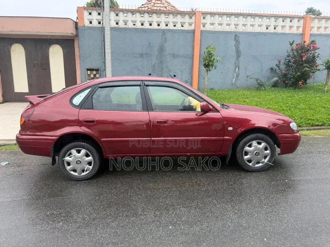 Toyota Corolla 2002 Rouge