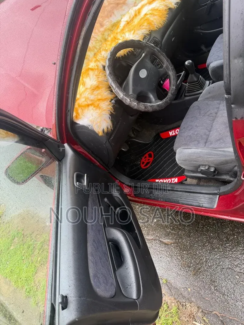 Toyota Corolla 2002 Rouge