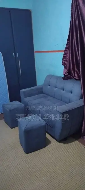 Fauteuil + 2 Pouffes