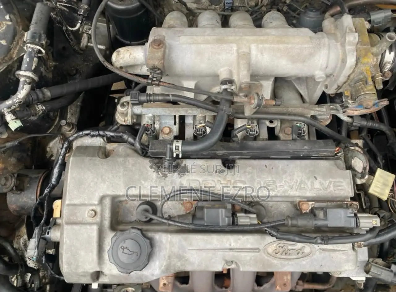 Mazda 323 2015 Gris