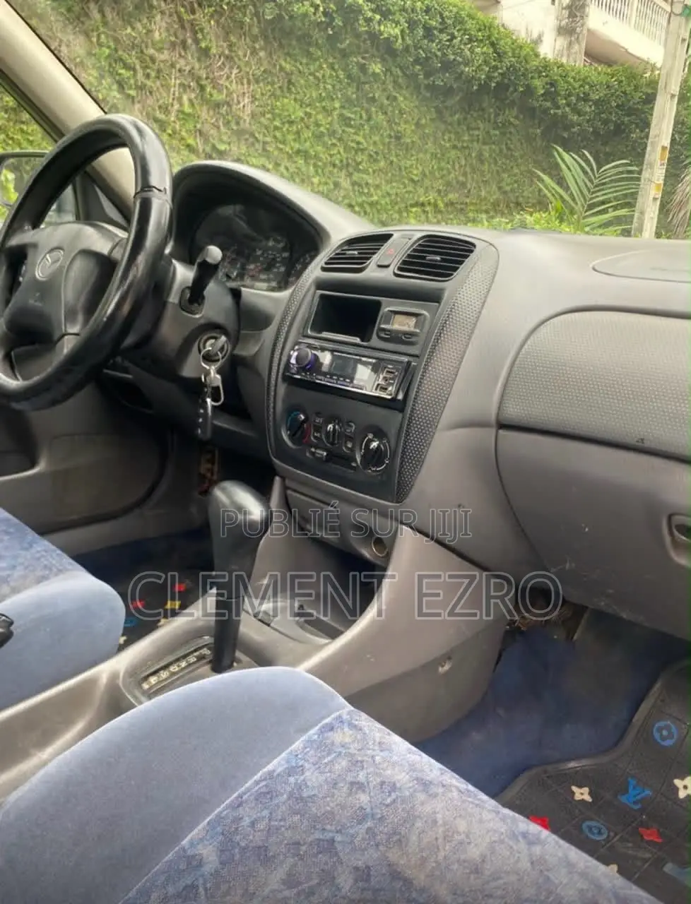Mazda 323 2015 Gris